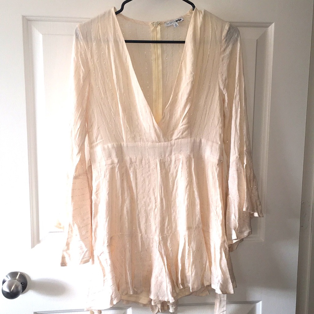 Fashion nova Sunday Brunch Romper. New without tags.
